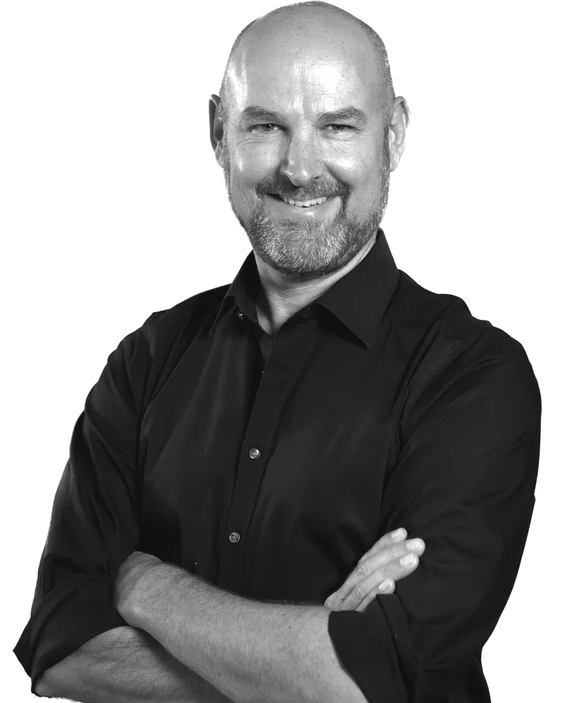 Bild von Jörg Kuschezki in Schwarz-Weiss mit Kontaktinformationen