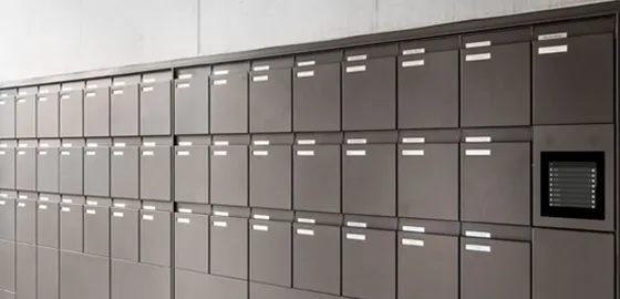 Referenz Ernst Schweizer AG: Foto einer großen Briefkastenanlage